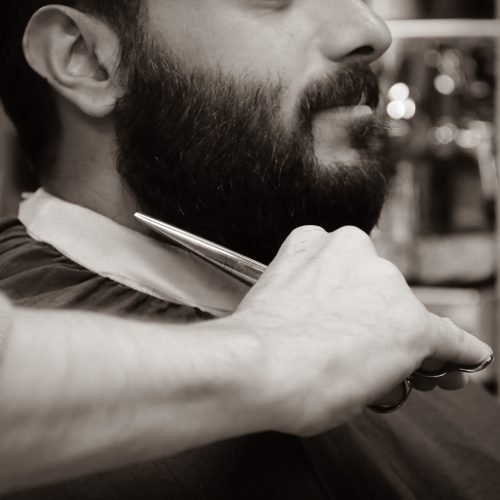 closeup-of-a-man-with-beard-visiting-barbershop-2024-10-18-05-47-45-utc